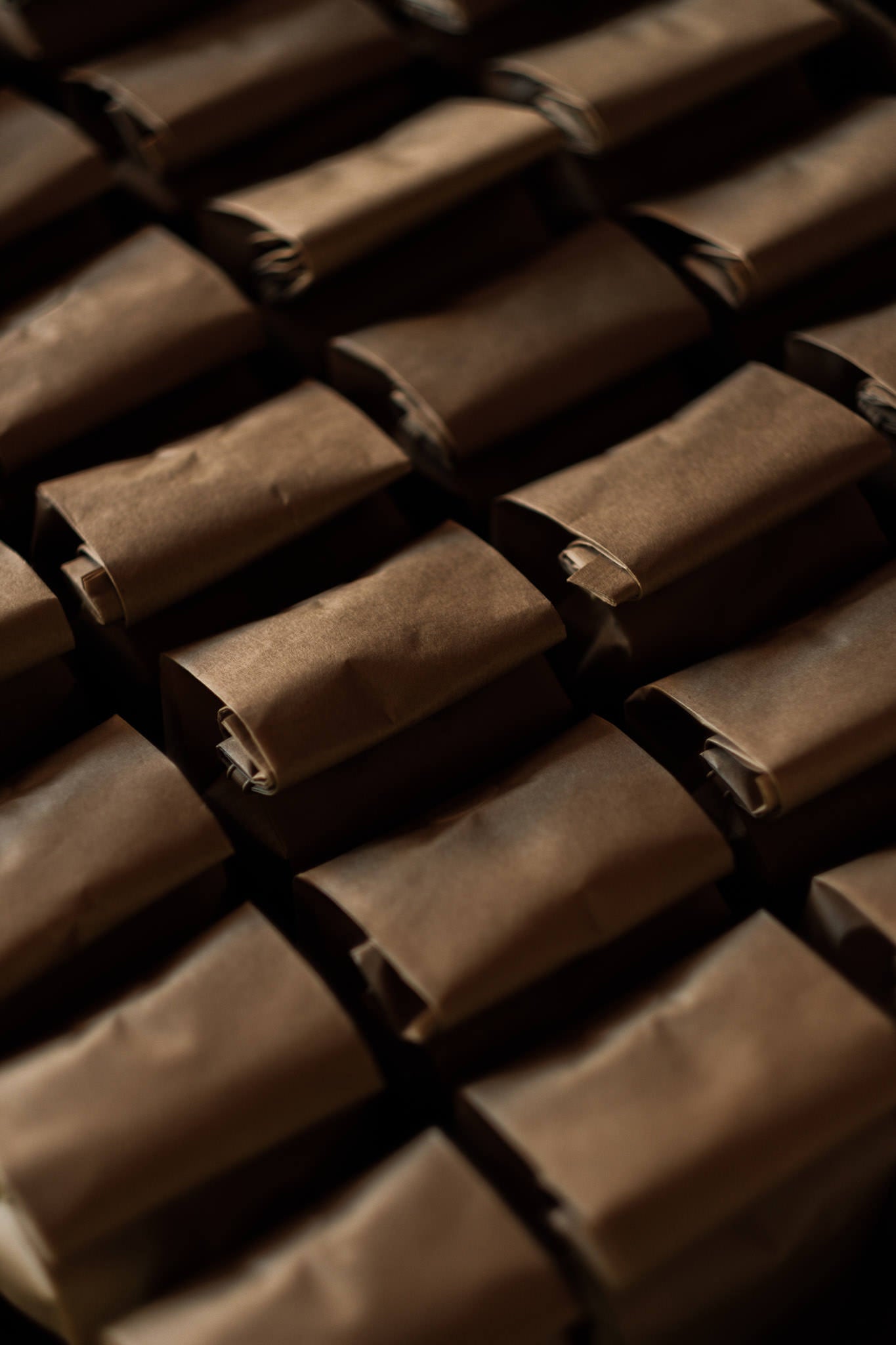 A picture of a pallet full of 12 ounce bags of Exo coffee